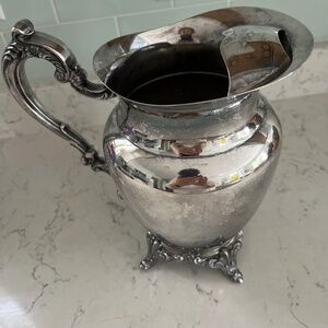Silver plated, footed, water pitcher